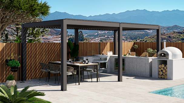 Modern aluminium pergola covering an outdoor kitchen and dining area beside a swimming pool.