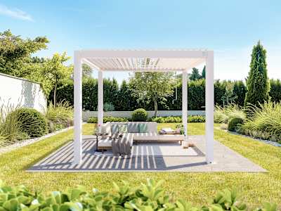 White aluminium pergola with an adjustable louvered roof over an outdoor seating area in a landscaped garden.