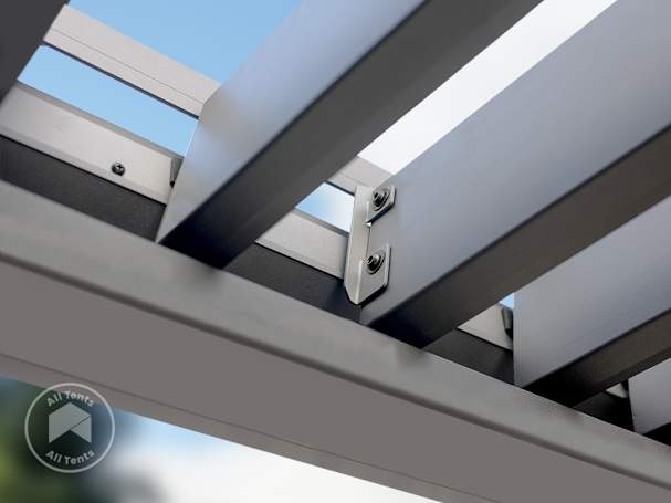 Close-up of adjustable louvered pergola roof slats opened to provide sunlight and airflow