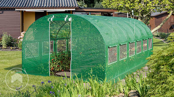 Hoop house greenhouse with roll-up doors and side windows in backyard garden