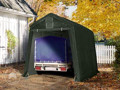 Premium portable garage shelter with reinforced frame and green tarpaulin, suitable for small trucks