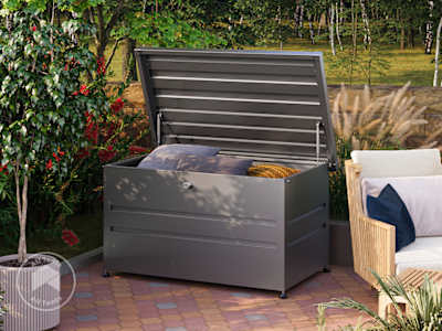 Steel deck box with gas-assisted lid in a yard