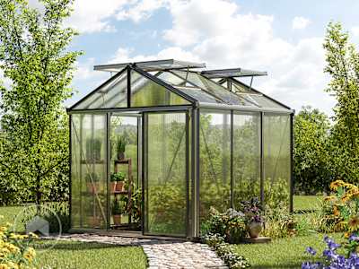 Aluminum greenhouse with polycarbonate panels in a backyard garden