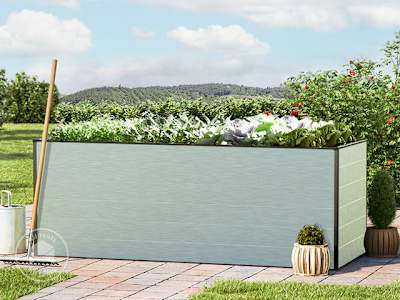 Raised garden bed with vegetables on a patio