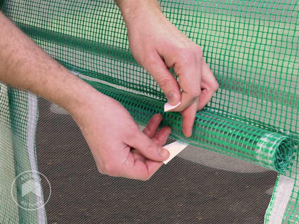 Velcro fastening on roll-up hoop house side panel