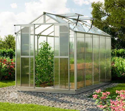 freestanding greenhouse in backyard