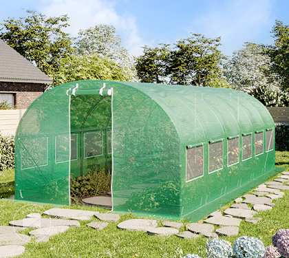 freestanding hoop house greenhouse in backyard
