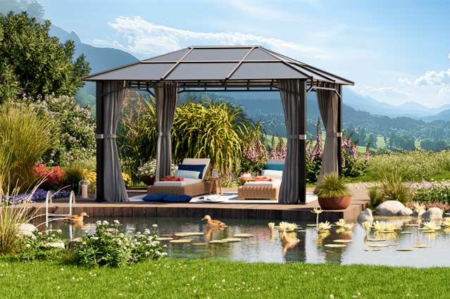 sunset deluxe gazebo positioned next to a zen pond with a valley in the background